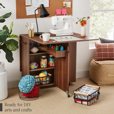 Best Choice Products Multipurpose Folding Table W/ Built-in Wheels, 3 Storage Shelves, Cubby, Carrying Handle 4 Best Choice Products Multipurpose Folding Table W/ Built-in Wheels, 3 Storage Shelves, Cubby, Carrying Handle - Image 2